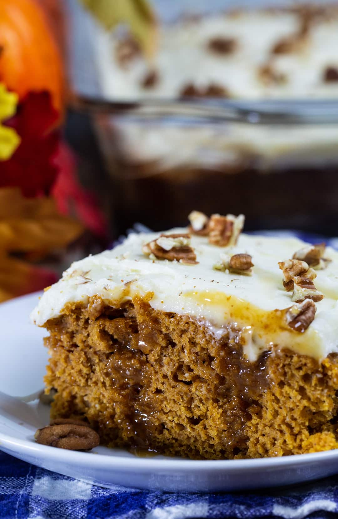 Slice of poke cake on a plate.