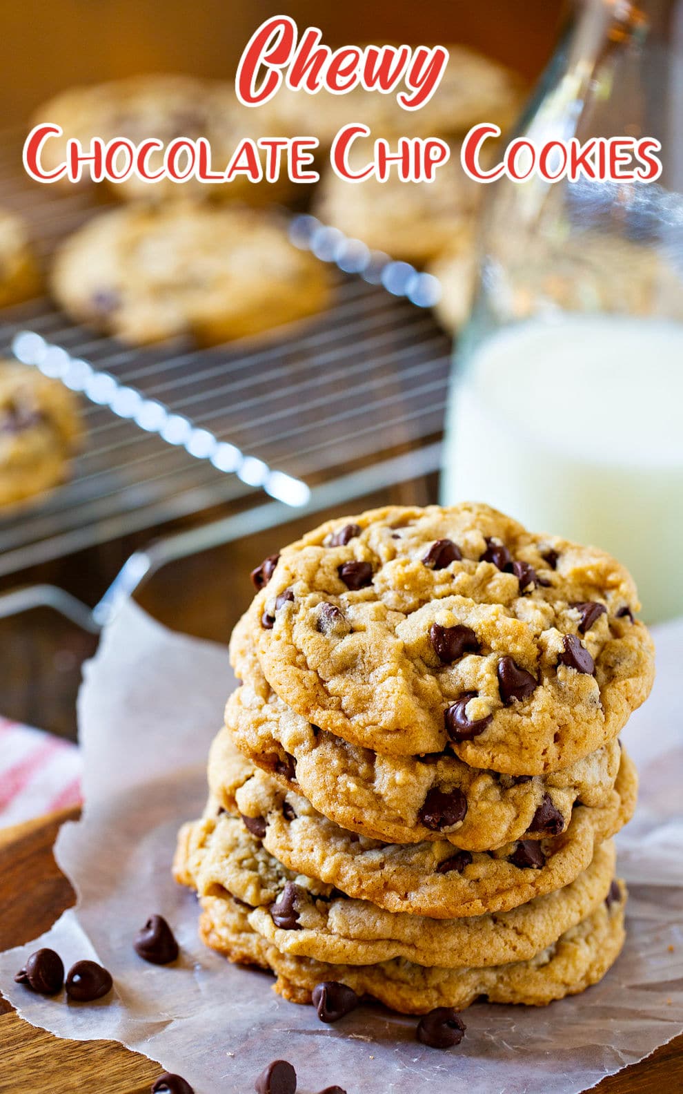 Chewy Chocolaste Chip Cookies piled up on a plate.