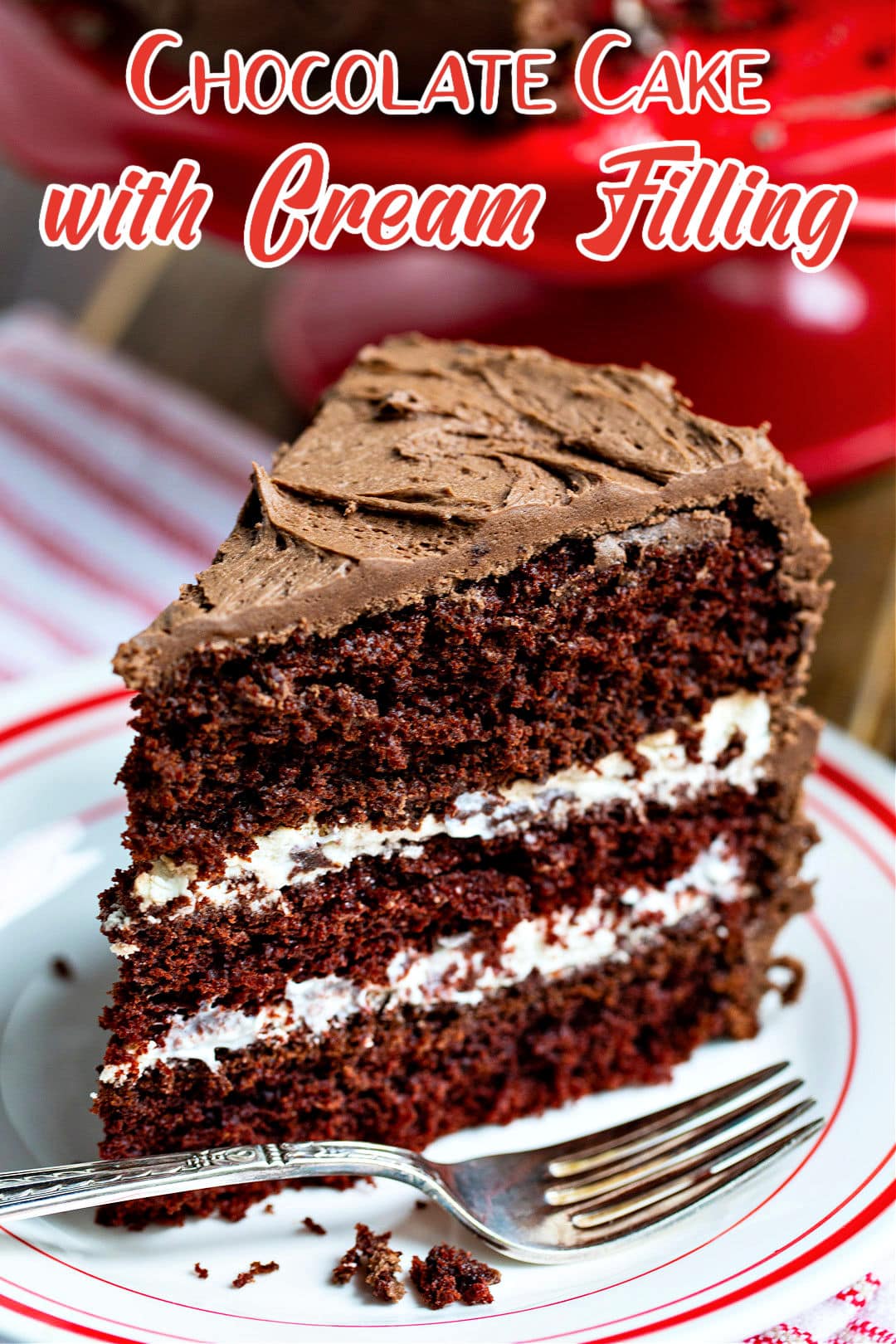 Slice of Chocolate Cake with Cream Filling on a plate.