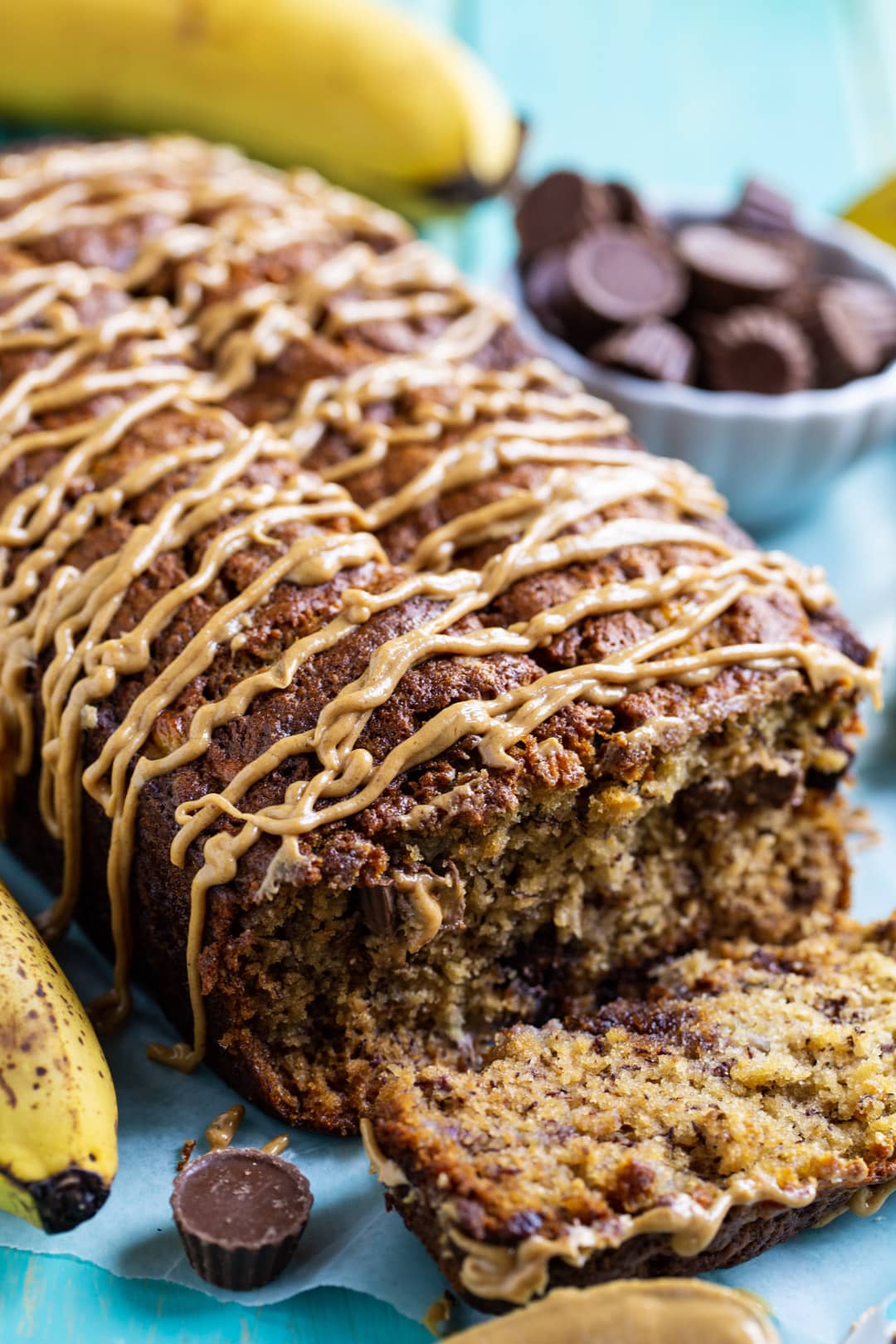 Peanut Butter Cup Banana Bread with slice cut.