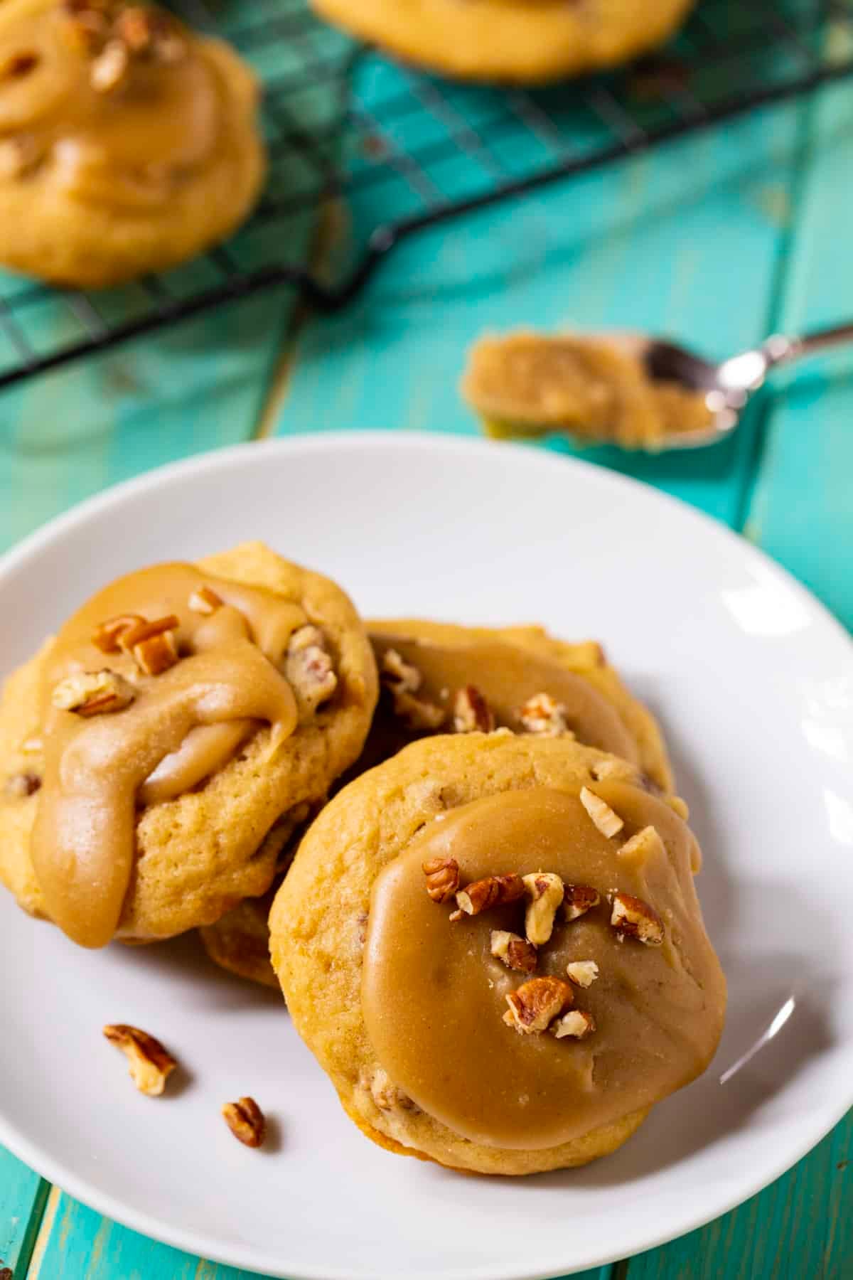 Three cookies on a plate.