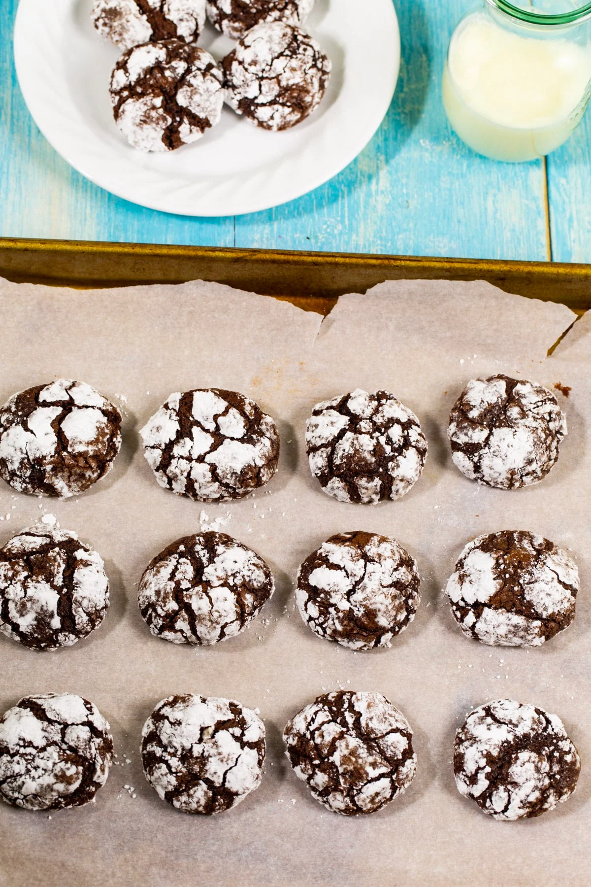 Cookies on baking sheet and on plate.