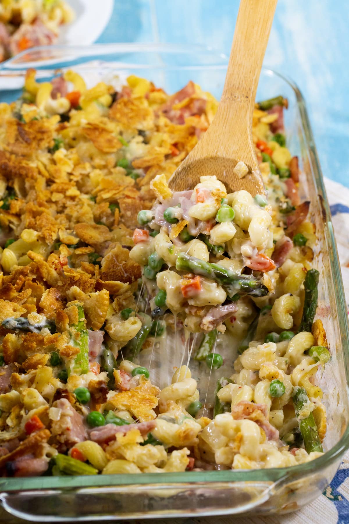 Spoon scooping up casserole.