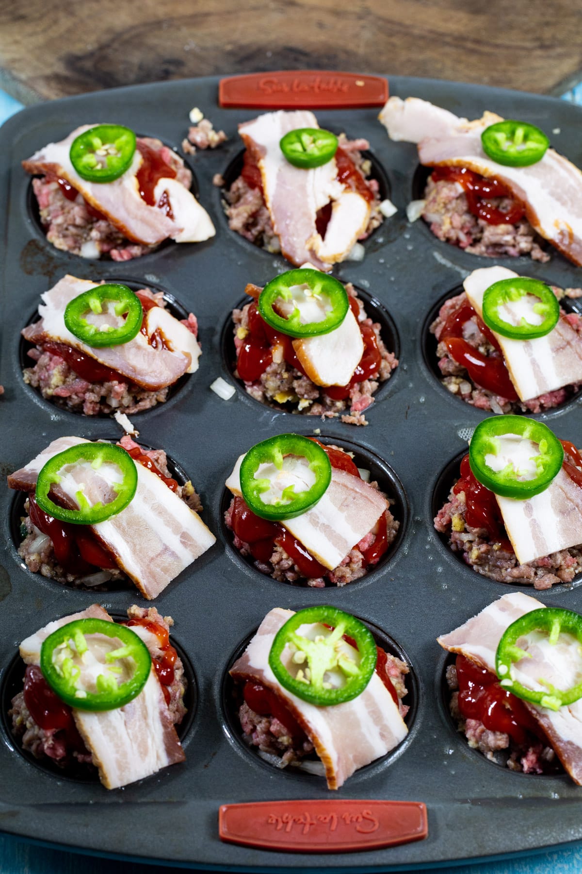 Bacon and jalapeno placed on top.