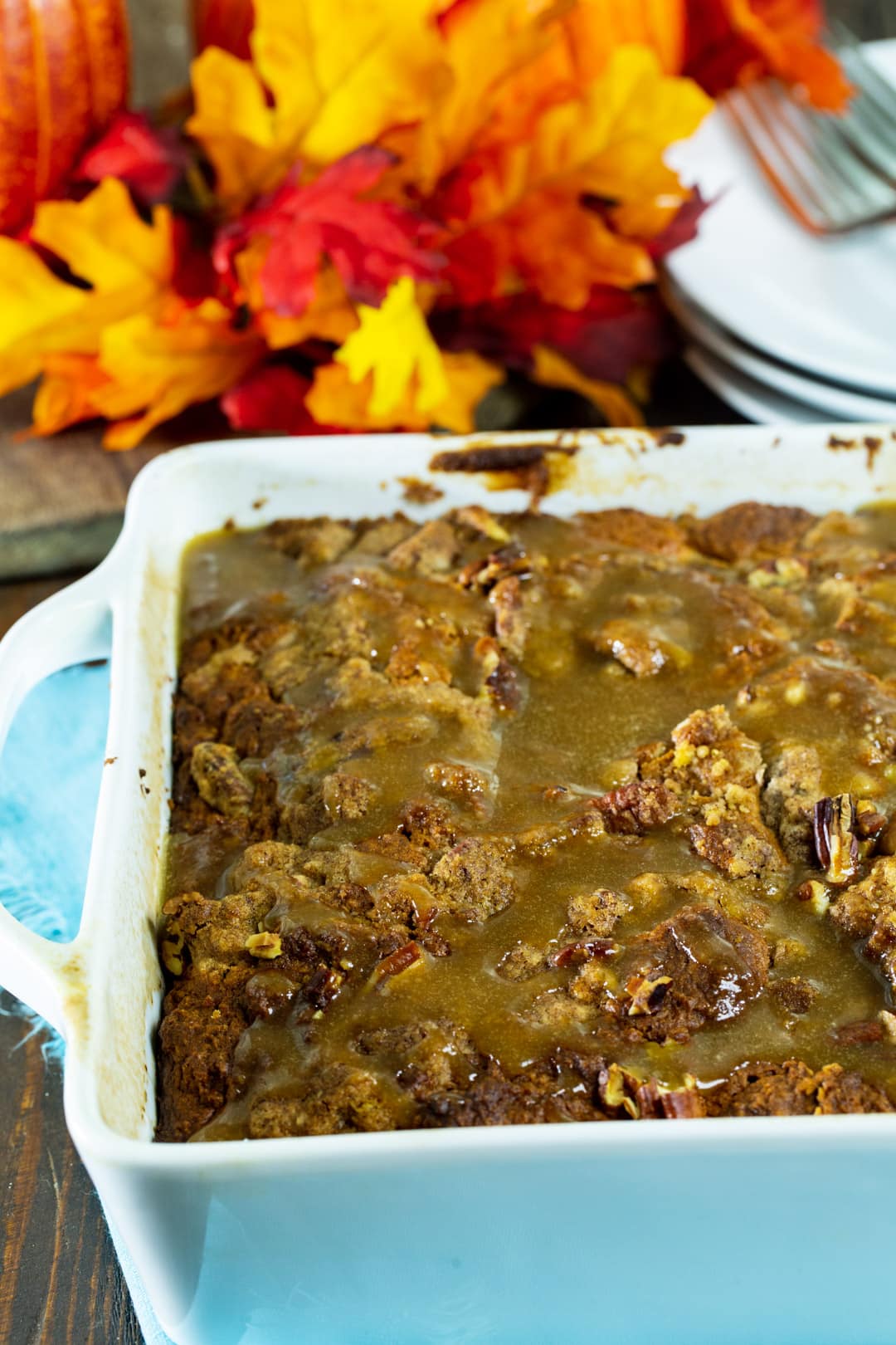 Coffee Cake topped with glaze in baking dish.