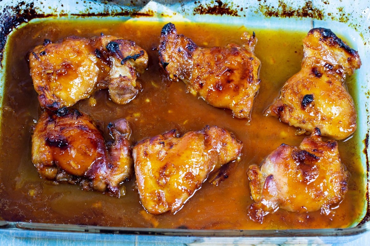 Baked chicken in baking dish.