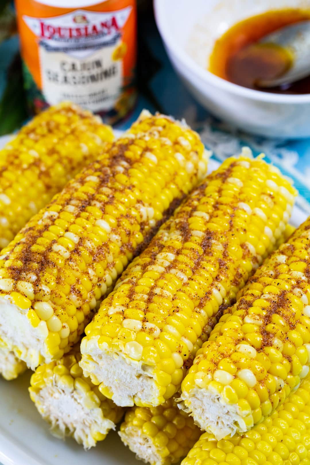 Cajun Buttered Corn piled up on plate.