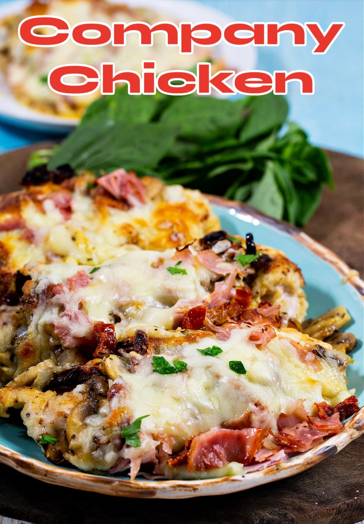 Company Chicken topped with ham, mushrooms and cheese.