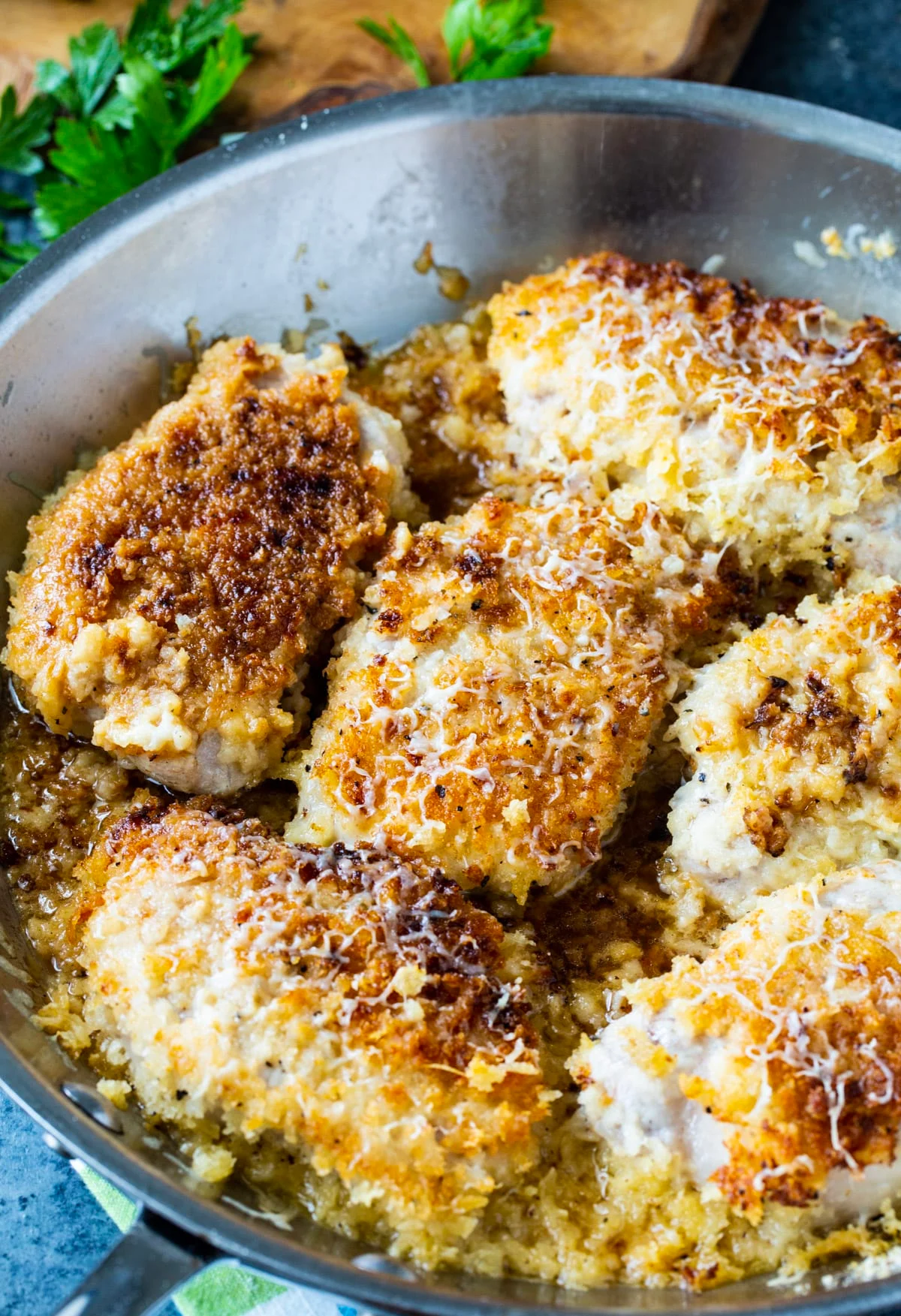 Pork Chops in a skillet.
