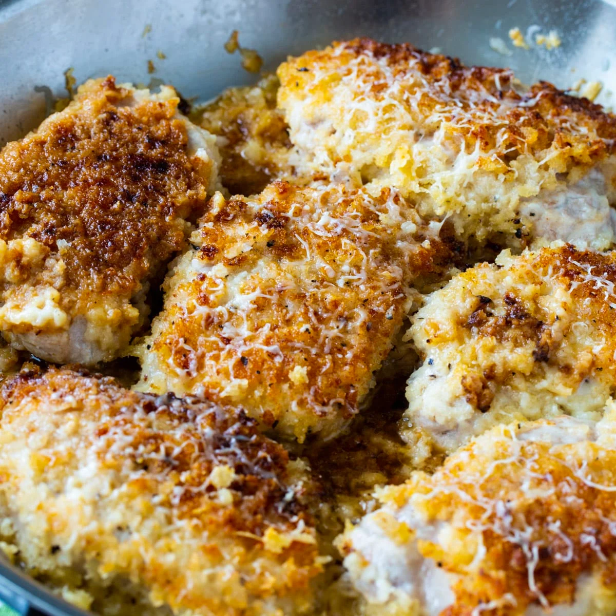 Buttermilk Parmesan Pork Chops in a skillet.