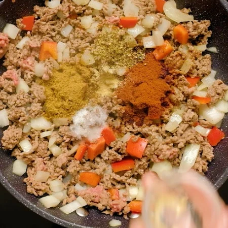 Adding spices.