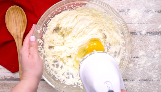 Mixing in eggs.