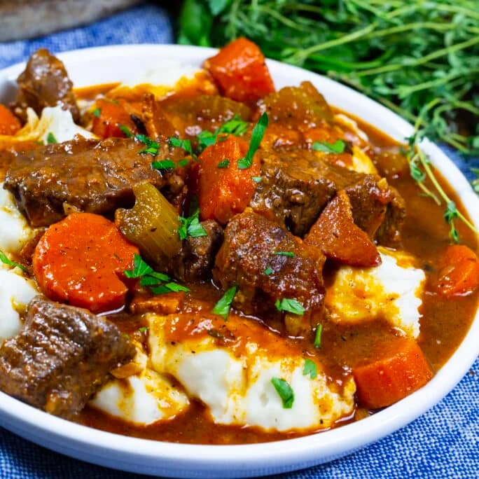 Irish Guinness Beef Stew over mashed potatoes.