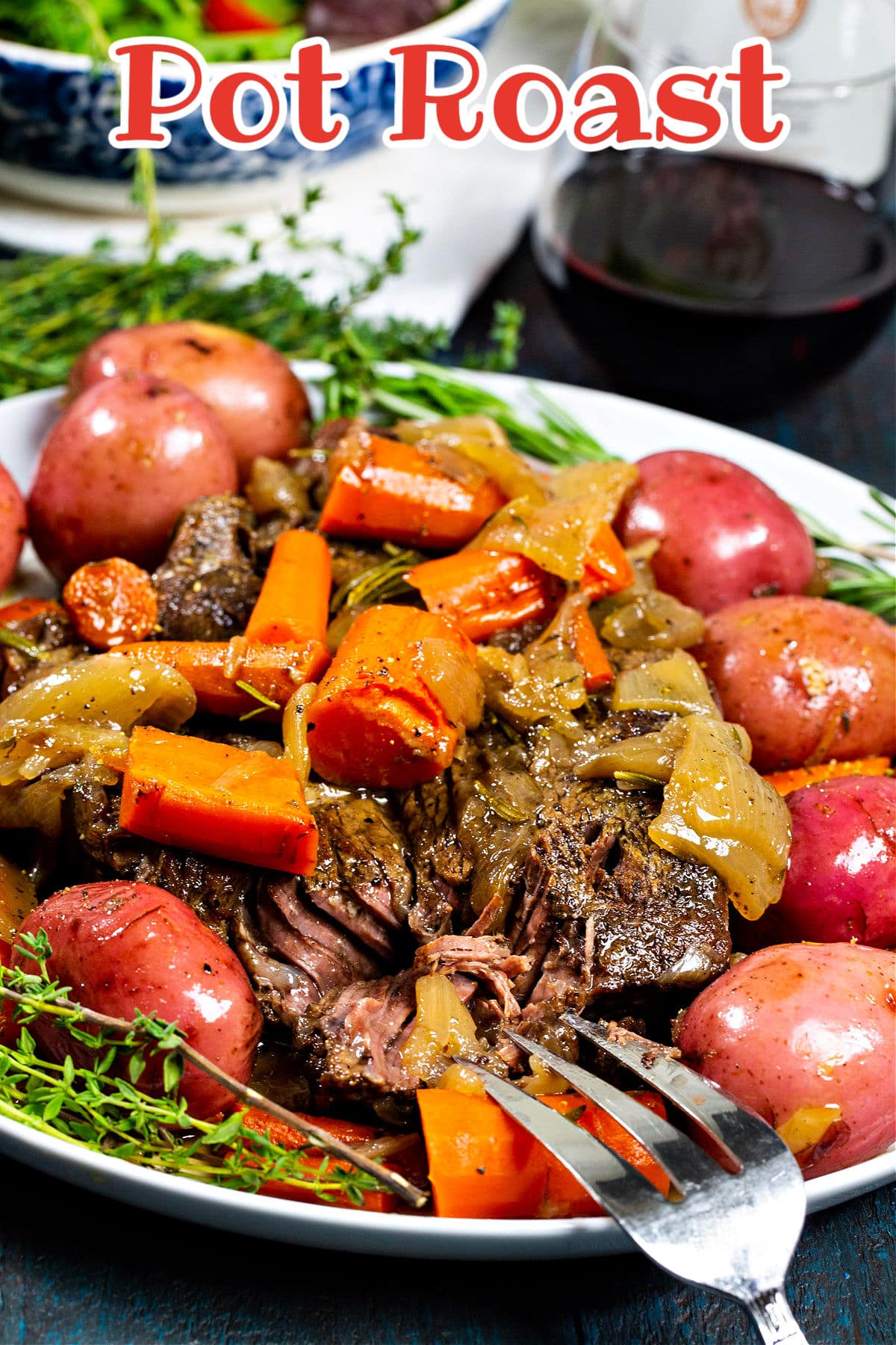 Fork cutting into pot roast.