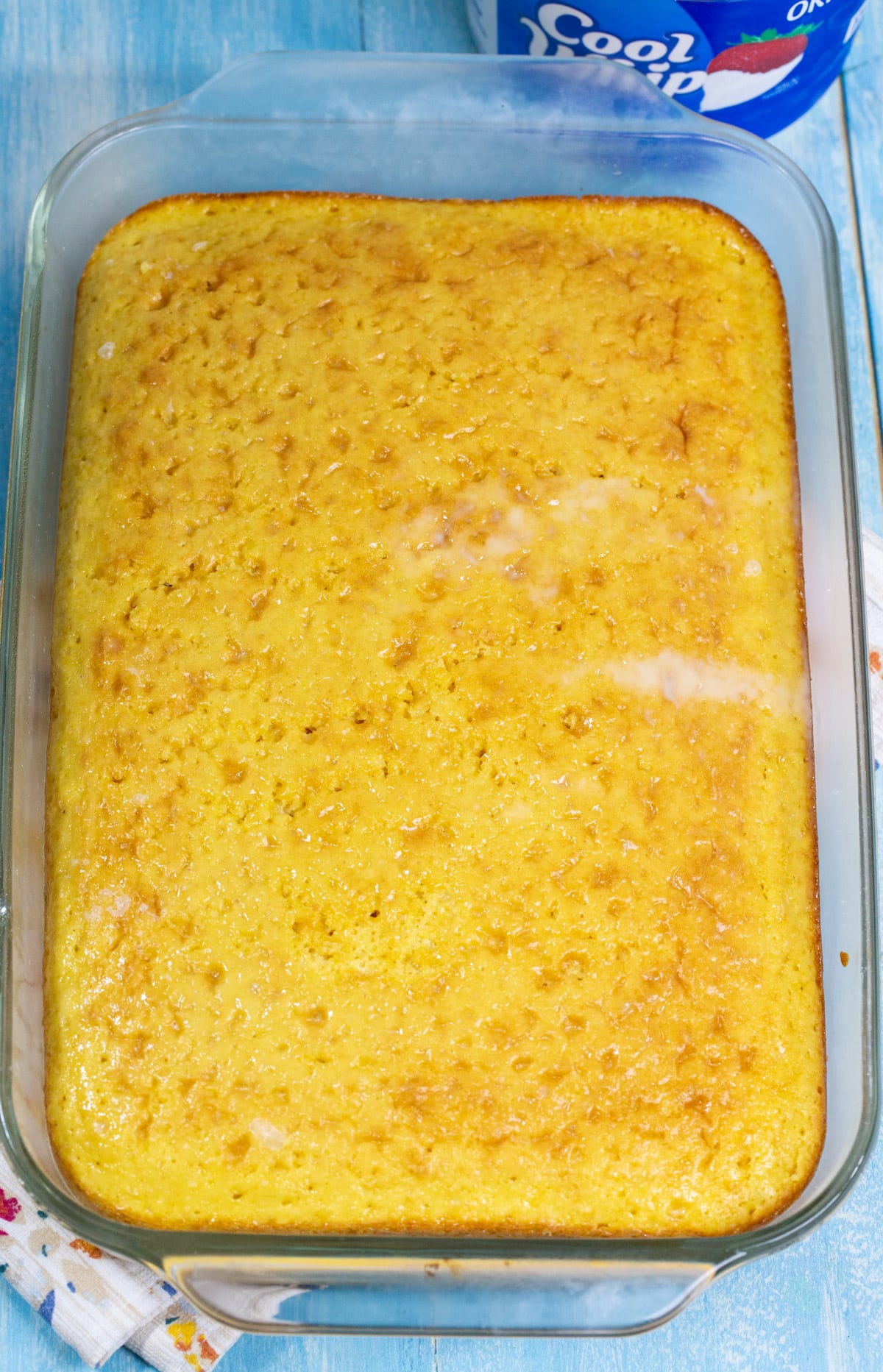 Unfrosted cake in 9x13-inch pan.