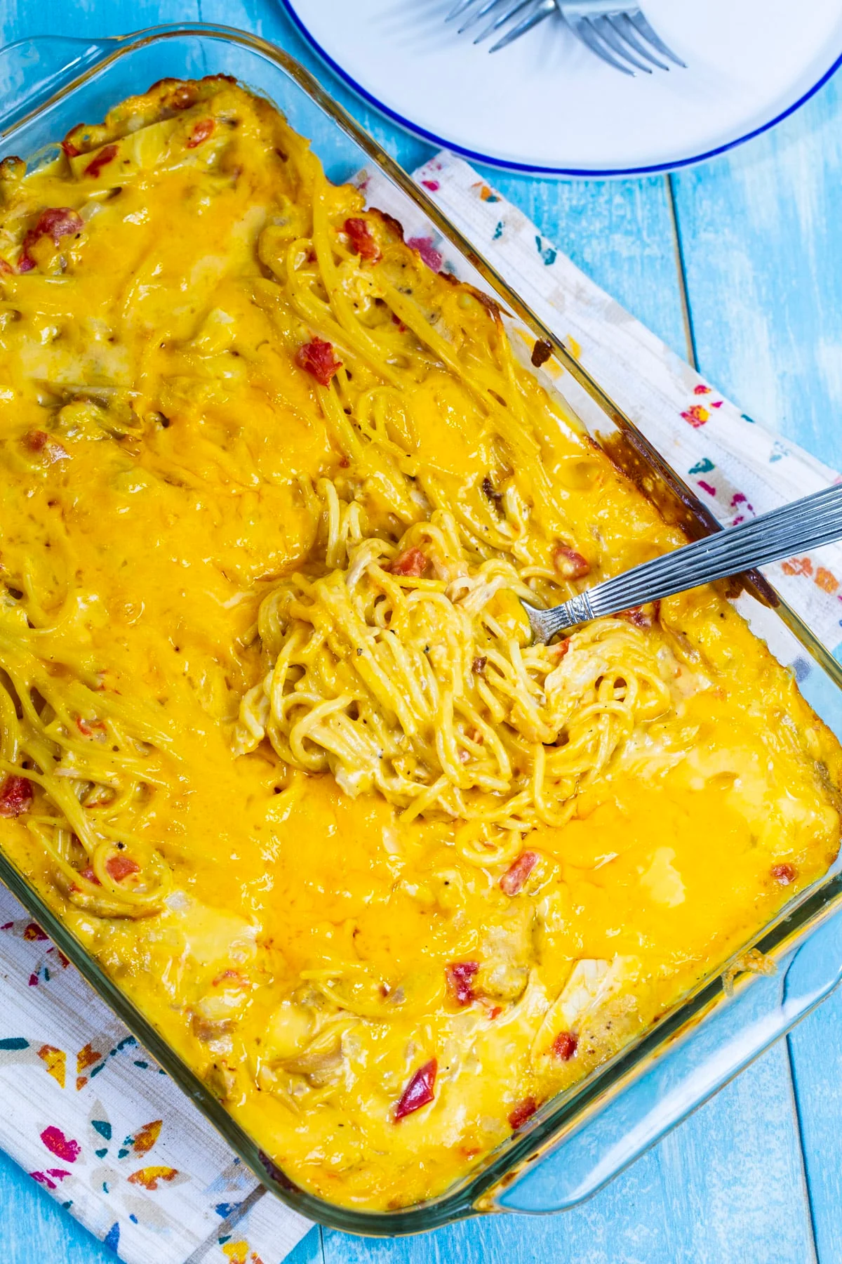 Chicken spaghetti casserle in baking dish.