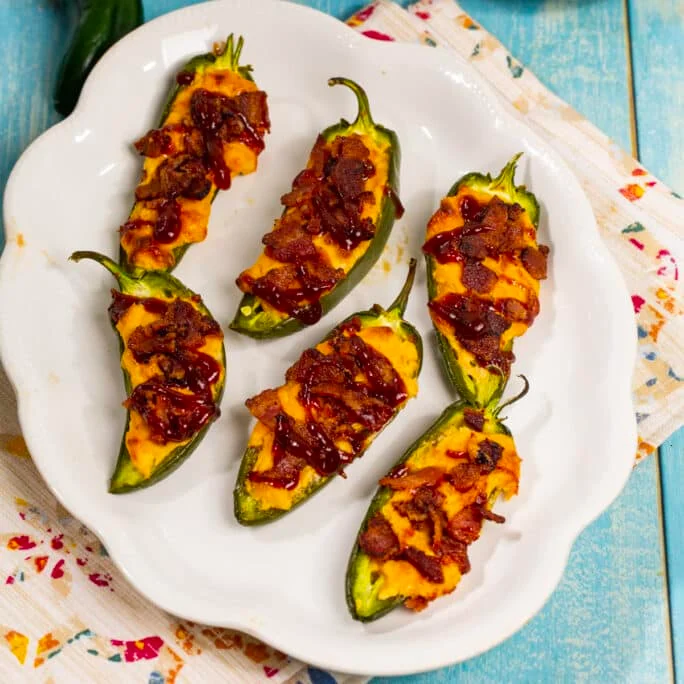 BBQ Bacon Jalapenos on a serving plate.