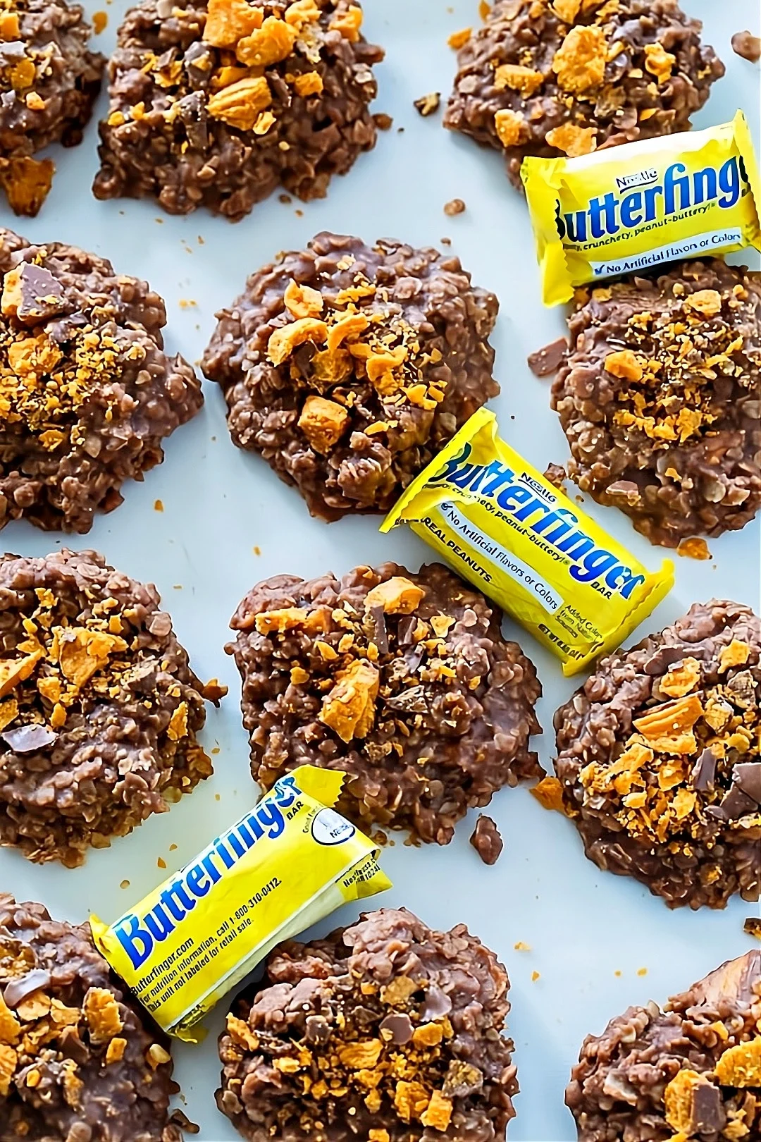 Cookies spread out on white surface.