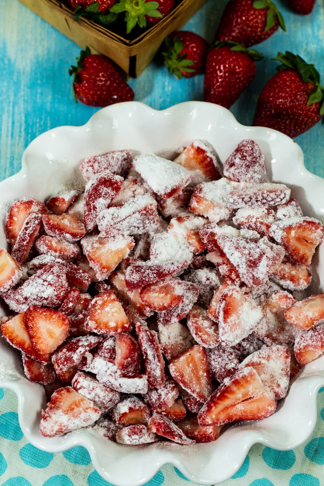 Strawberry filling in pie plate before being baked.