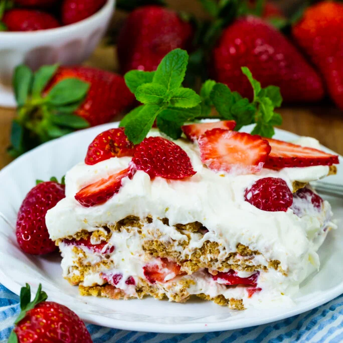 Piece of Strawberry Icebox Dessert on a small plate.