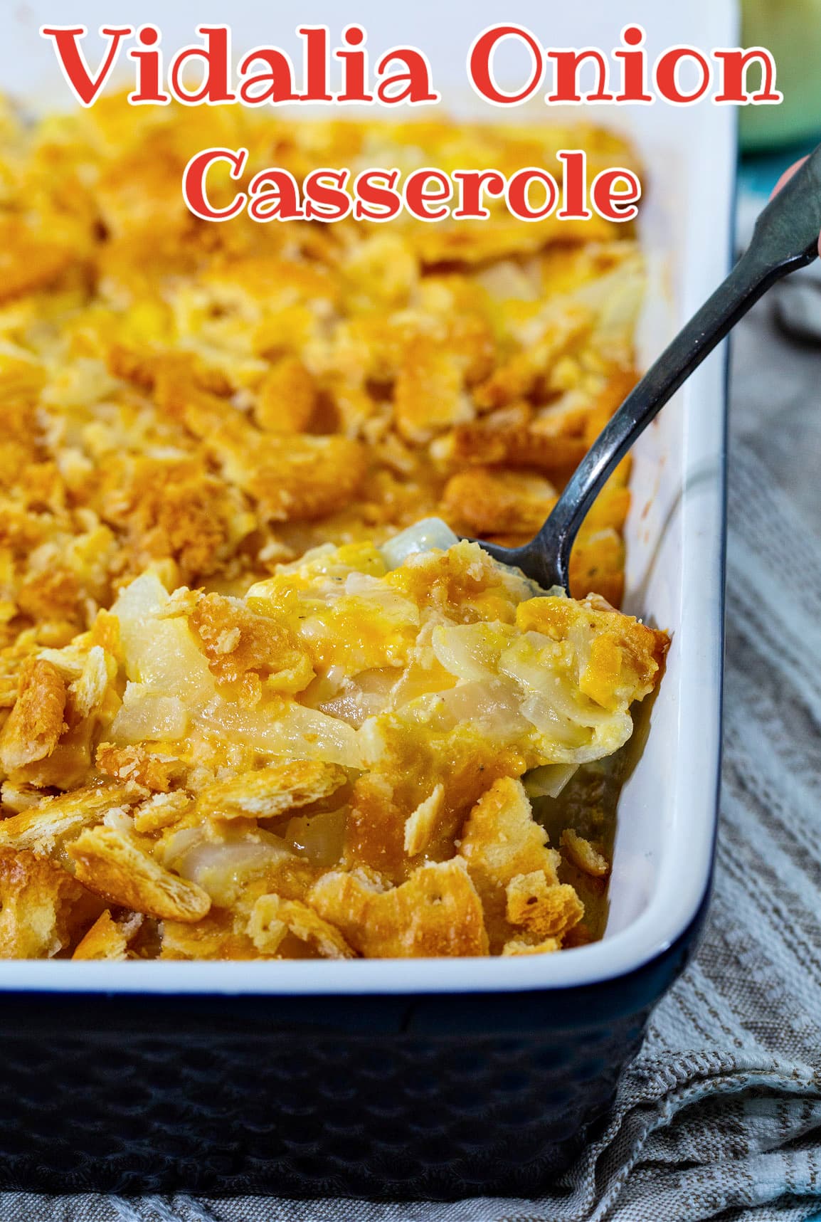 Spoon scooping up Vidalia Onion Casserole.