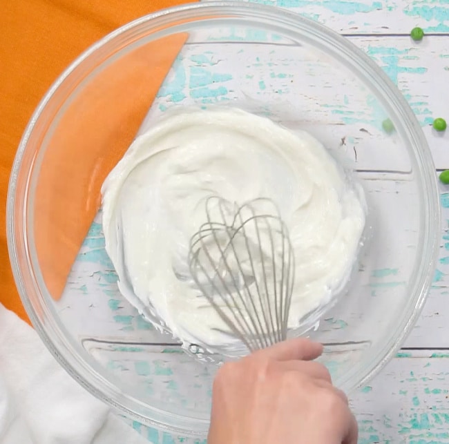 Mixing mayonnaise mixture.