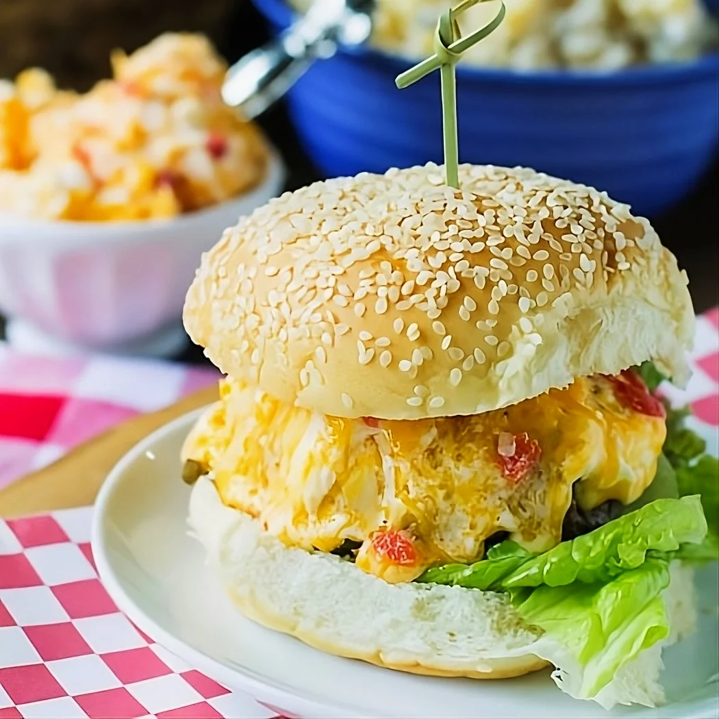 Pimento Cheese Burger on a bun with lettuce.