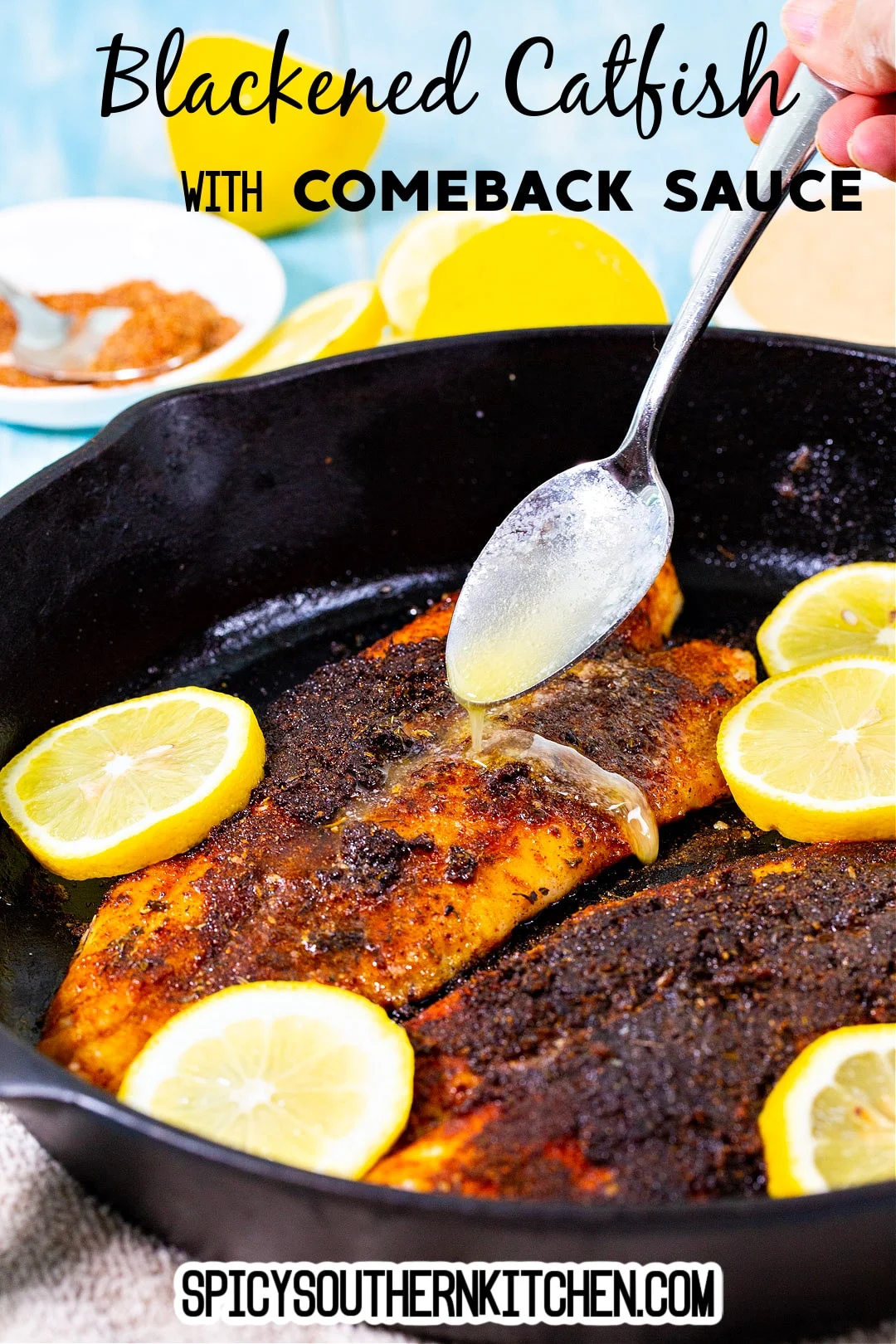 Spoon drizzling butter on catfish.