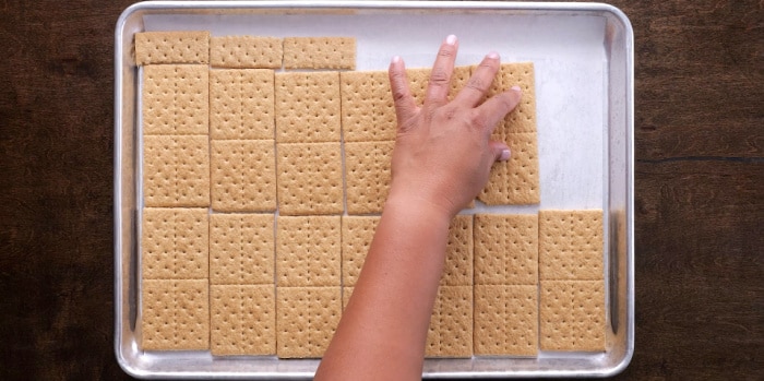 Arranging the graham crackers.