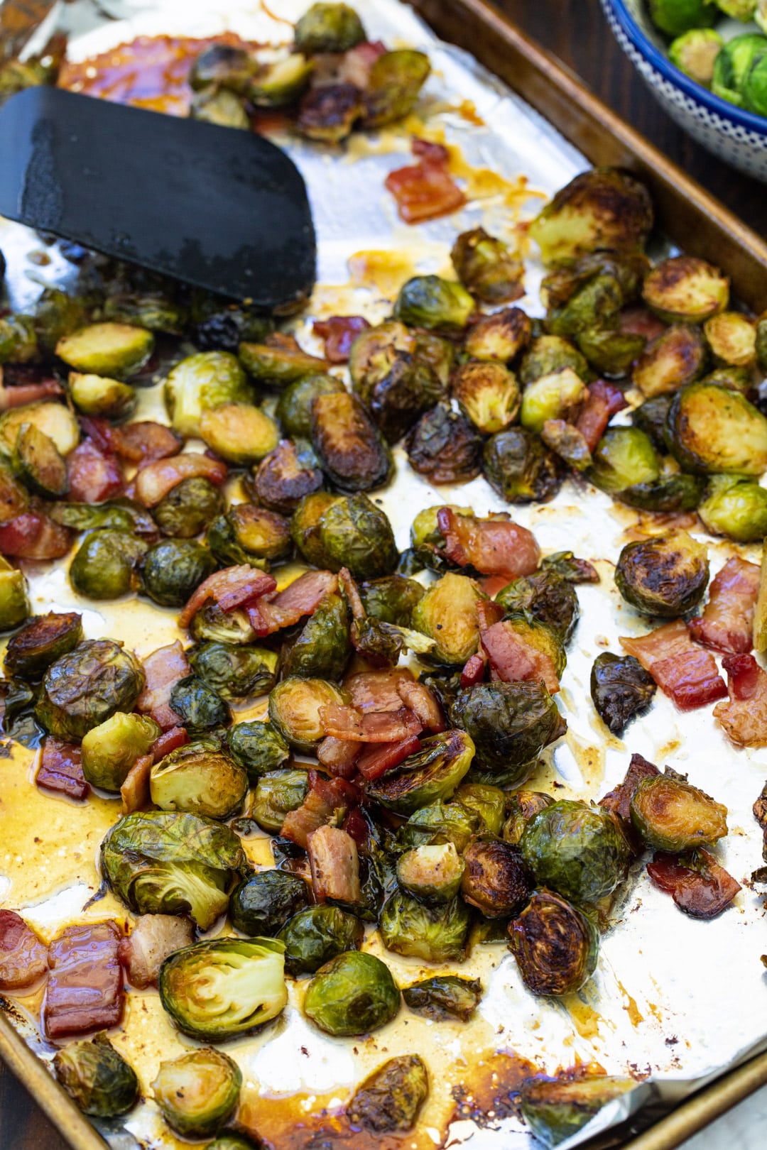 Glazed brussels sprouts on baking sheet.