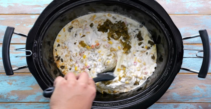 Stirring the ingredients.