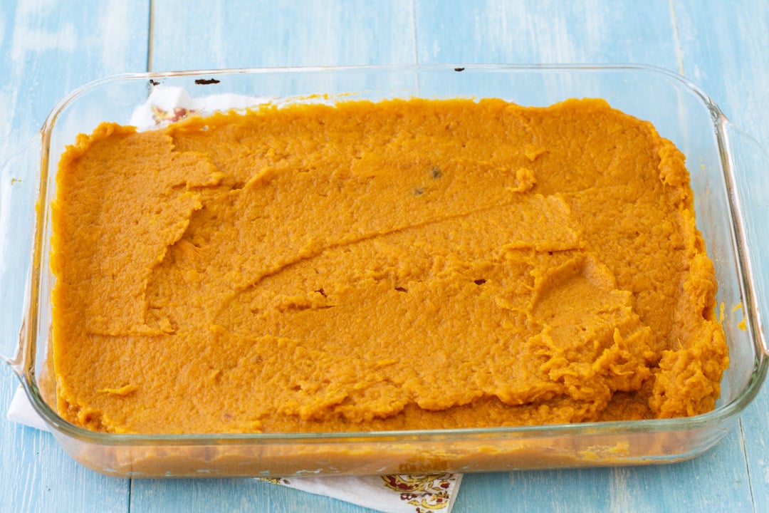 Sweet potato mixture spread in baking dish.