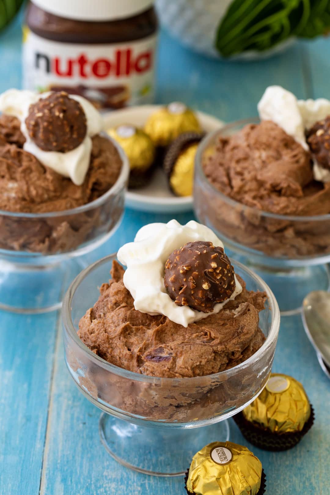 Mousse in 3 glass dishes.