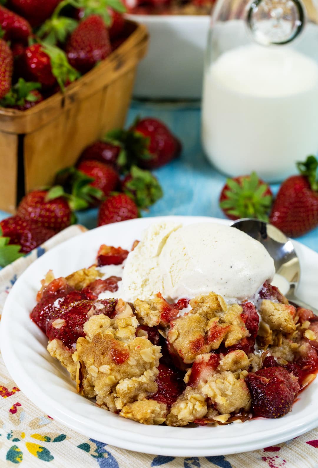 Strawberry Crisp topped with ice cream.