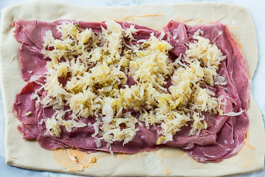 Dough with corned beef, sauerkraut, and Thousand Island
