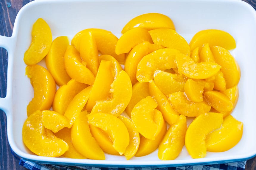 Peaches in the bottom of the baking dish