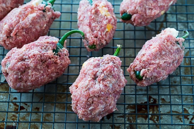 Wrap the jalapenos in with sausage.