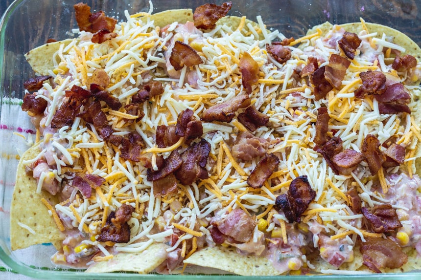 Assembling the chilaquiles in a 9x13-inch baking dish