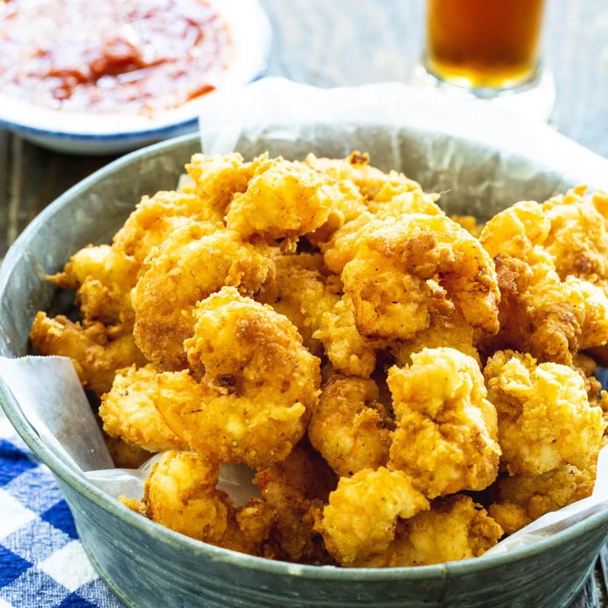 Crispy Calabash Shrimp in a metal tin.