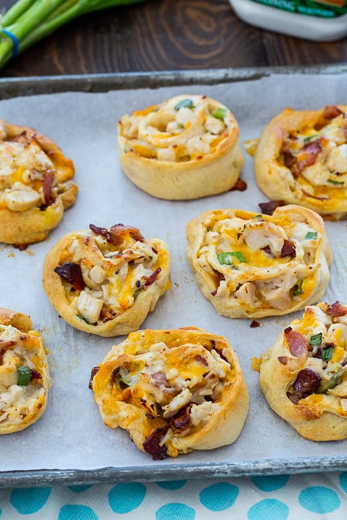 Ranch Chicken Roll-Ups on a baking sheet with parchment paper.