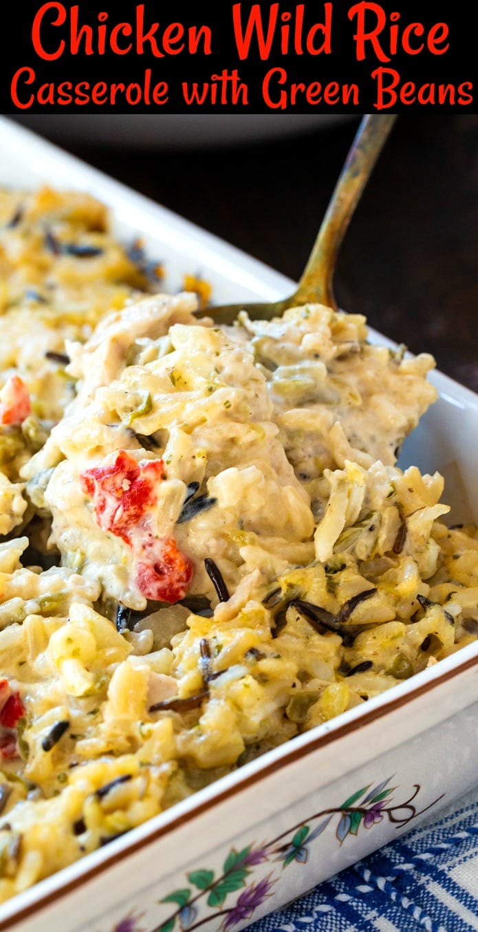 Spoon scooping up chicken casserole.