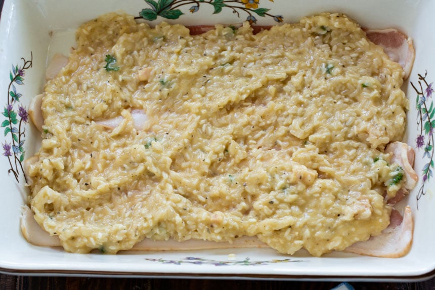 Spread chicken/rice mixture over bacon.