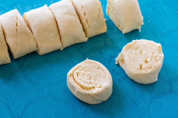 Cut crescent roll dough in slices