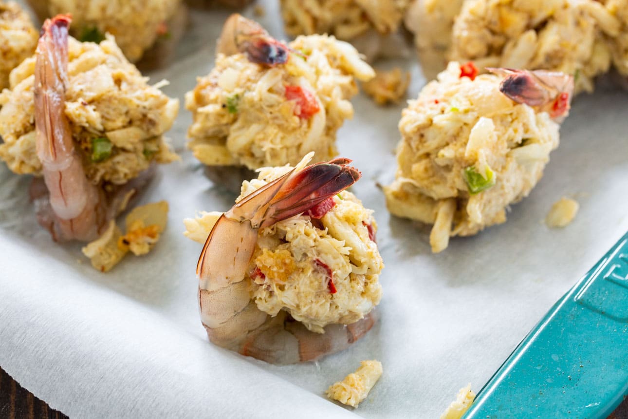 Place a ball of stuffing on each shrimp