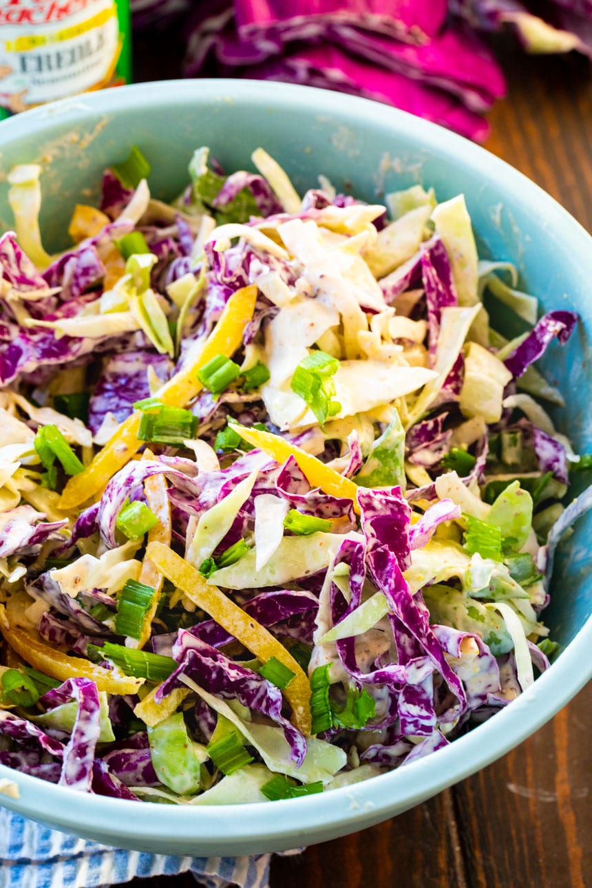 Coleslaw in a large blue bowl.