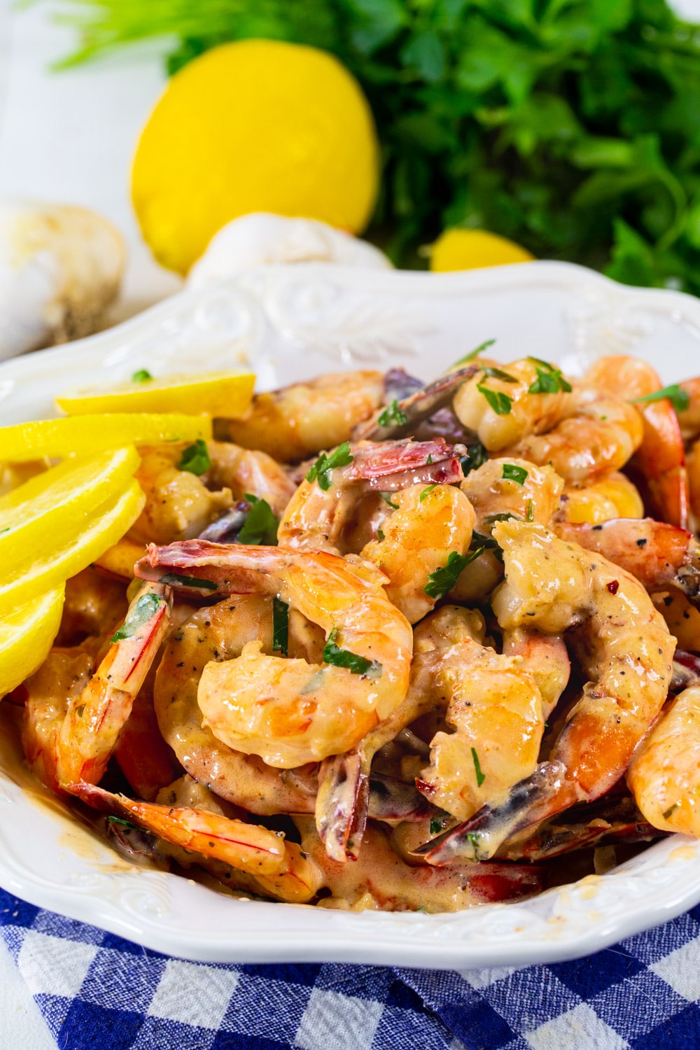 Creamy Lemon Garlic Butter Shrimp in a white bowl.
