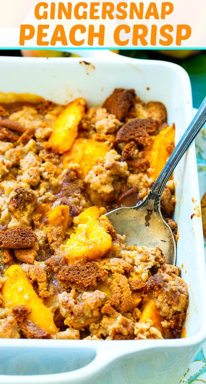 Peach Gingersnap Crisp being scooped with a spoon