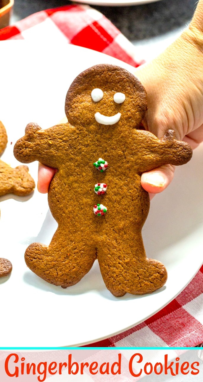 Hand holding a cookie.