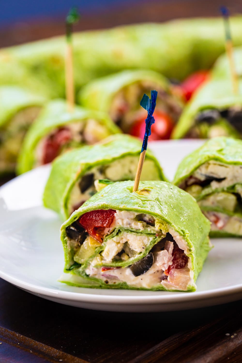 Greek Salad Pinwheels on a white plate.