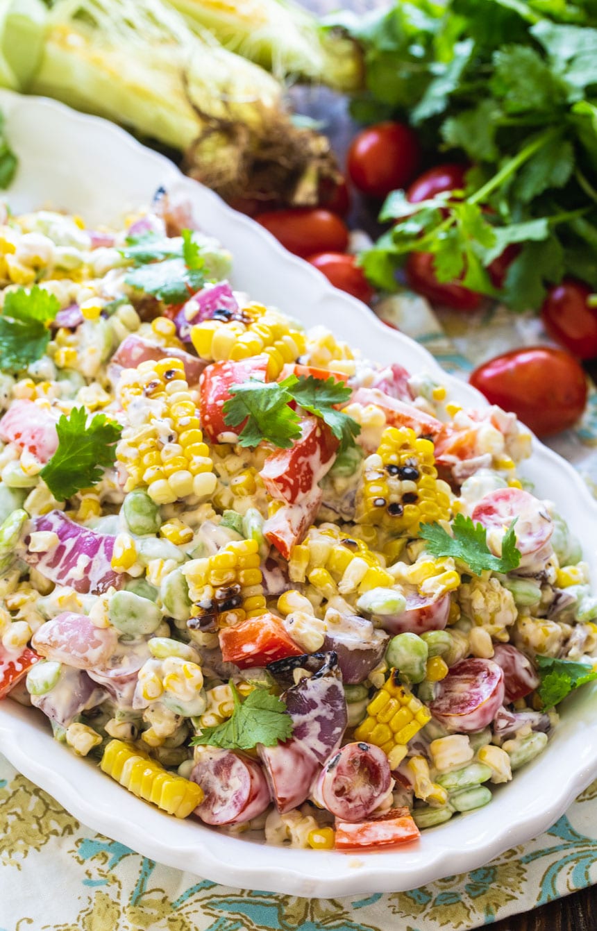 Grilled Corn and Butter Bean Salad on a white serving tray.